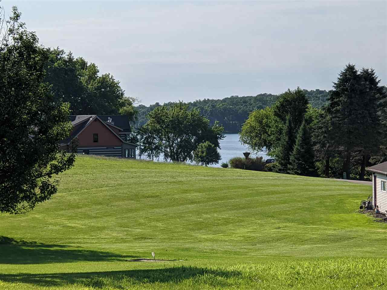 949 Lake Summerset Road Lake Summerset, IL 61019 - Photo 3 of 14 a view of a big yard with an outdoor space