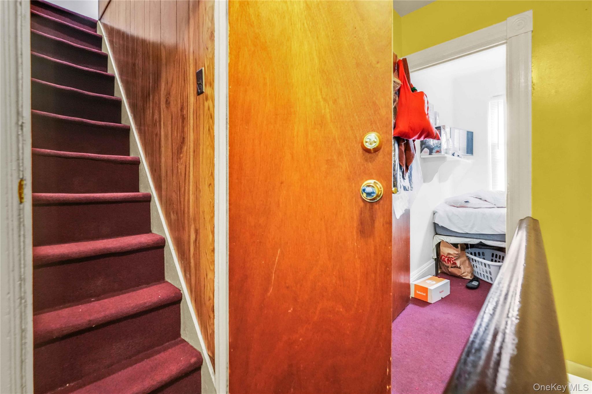 139 Spring Street Ossining, NY 10562 - Photo 19 of 29 Stairs with carpet and baseboards