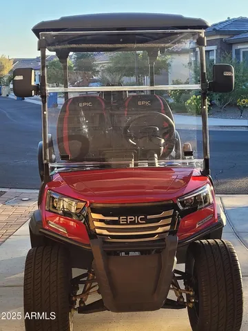 a view of a two chairs in the patio