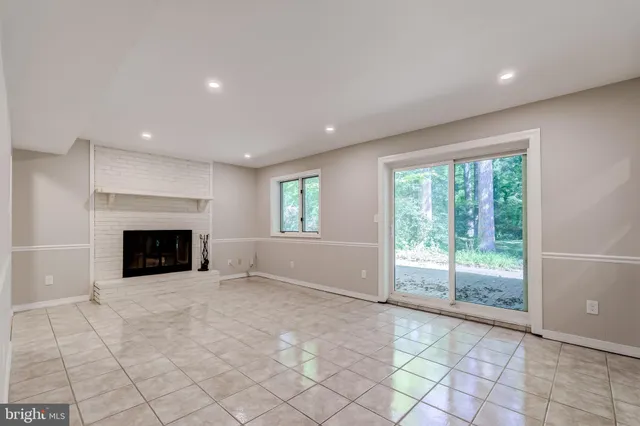 a kitchen with a stove a refrigerator and a sink