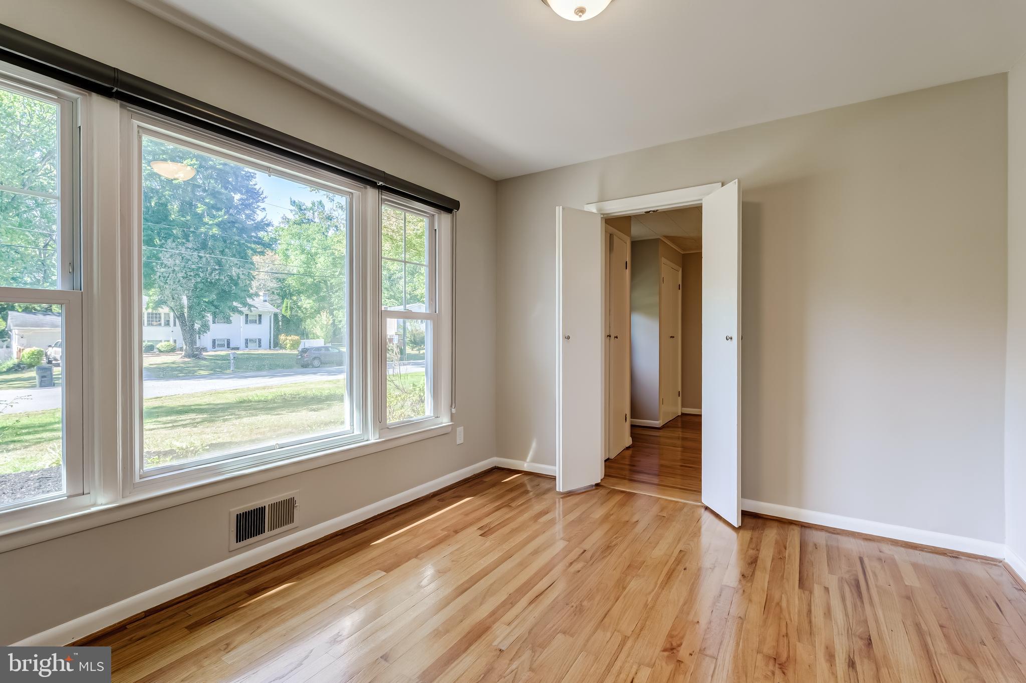 8817 Gateshead Road Alexandria, VA 22309 - Photo 27 of 78 a view of an empty room and window