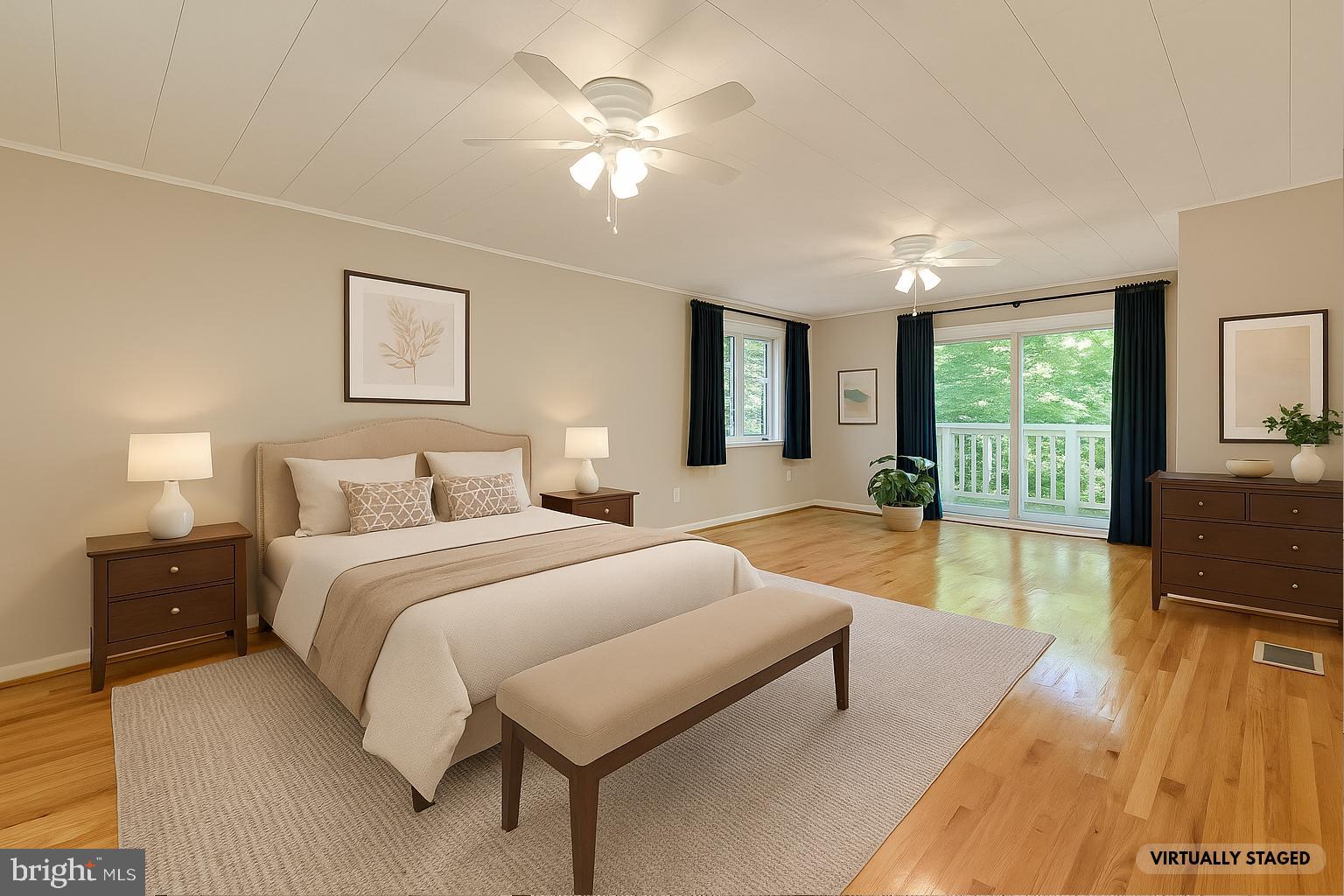 8817 Gateshead Road Alexandria, VA 22309 - Photo 4 of 78 a spacious bedroom with a large bed and a chandelier