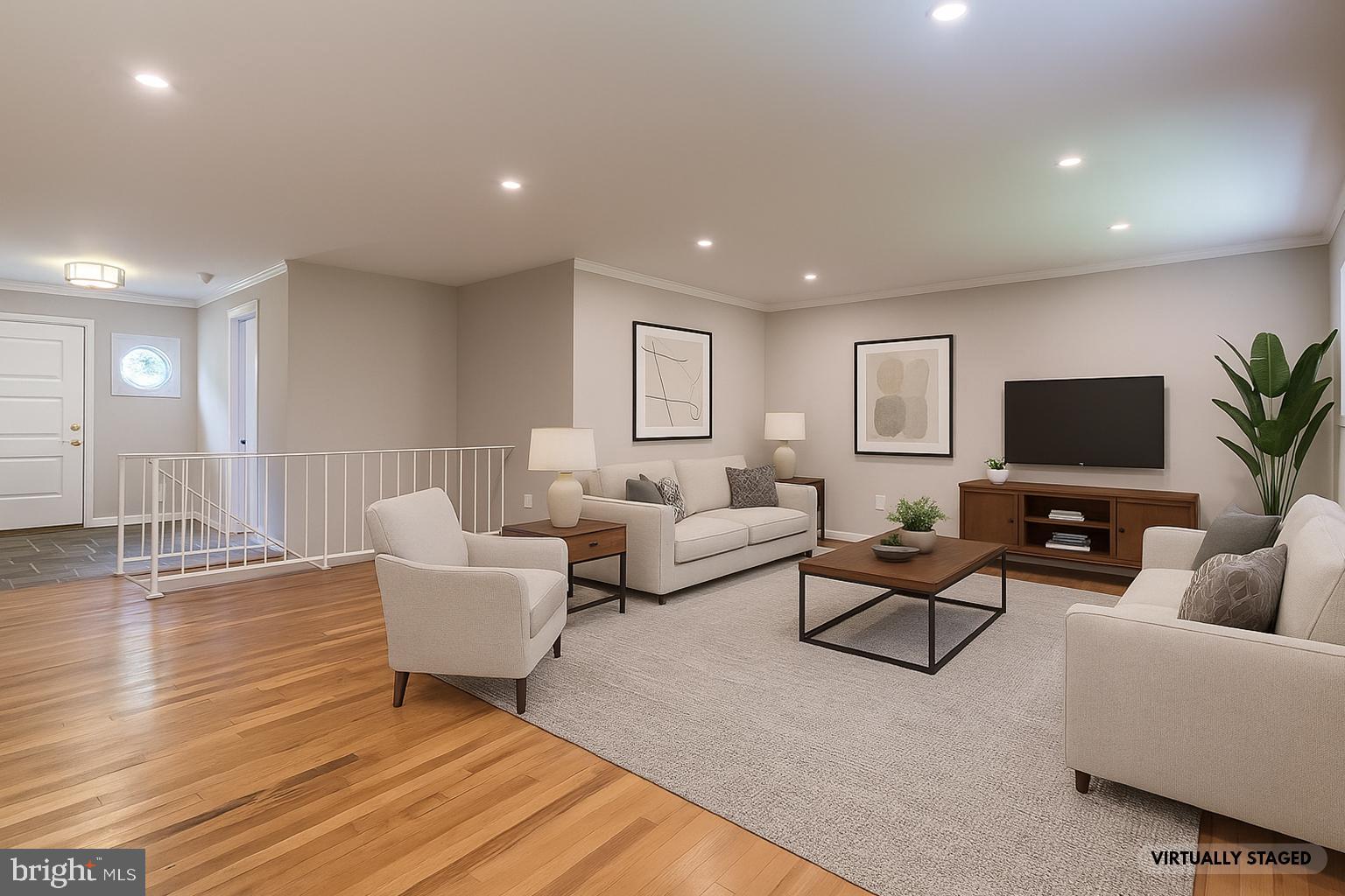 8817 Gateshead Road Alexandria, VA 22309 - Photo 5 of 78 a living room with furniture and a flat screen tv