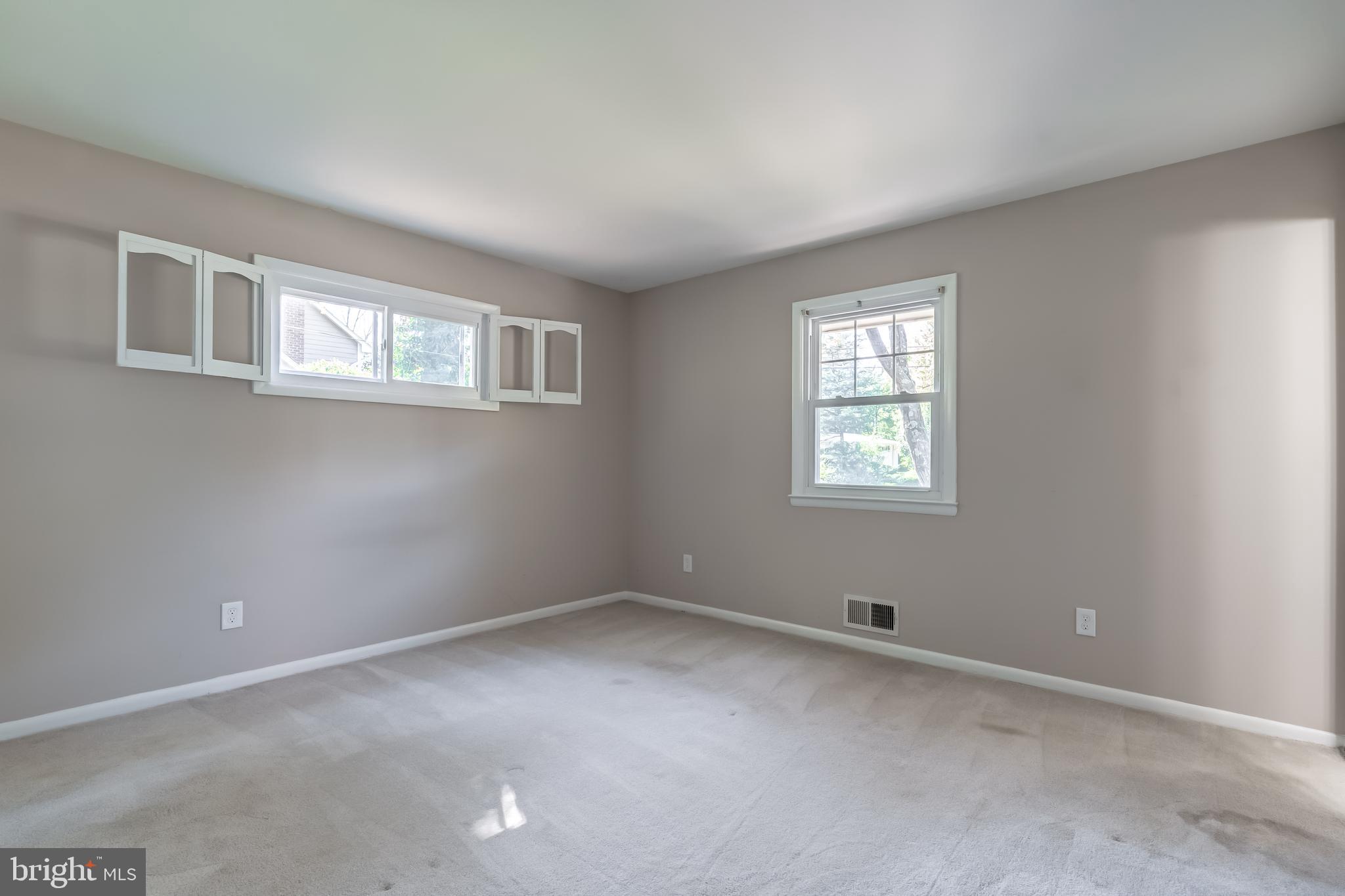 8817 Gateshead Road Alexandria, VA 22309 - Photo 55 of 78 a view of an empty room with a window