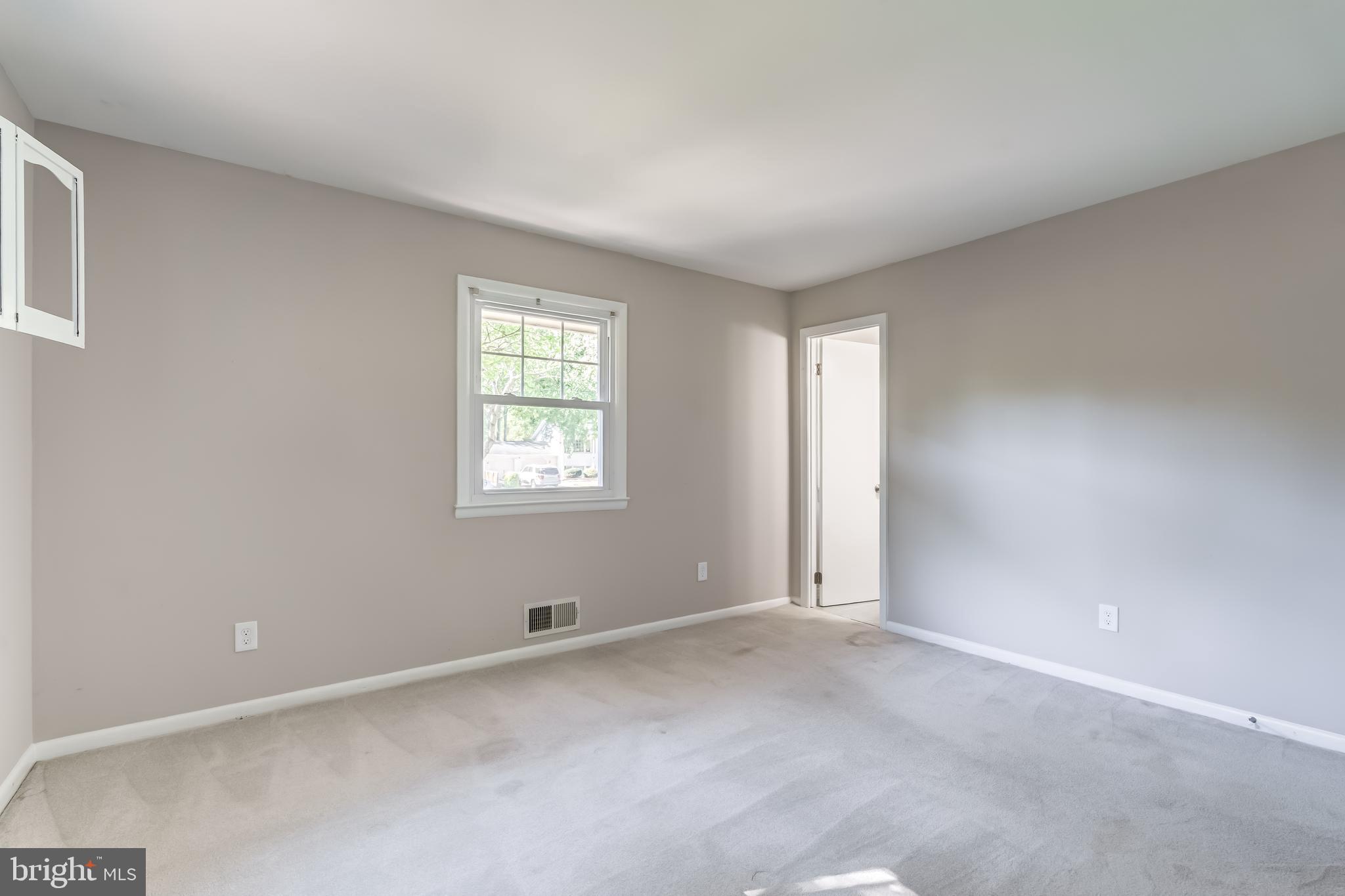 8817 Gateshead Road Alexandria, VA 22309 - Photo 58 of 78 an empty room with windows