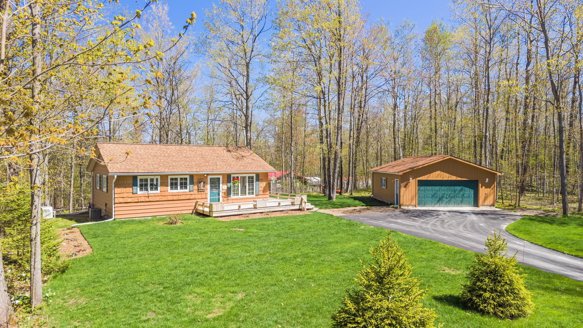 8185 Ridgeview Drive Cheboygan, MI 49721 - Photo 21 of 33 Front Exterior of Home and Garage