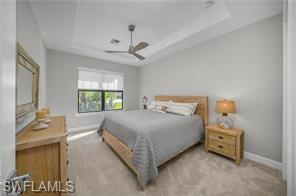 17574 Ashcomb Way Estero, FL 33928 - Photo 22 of 29 a bedroom with a bed and a window