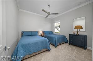 17574 Ashcomb Way Estero, FL 33928 - Photo 24 of 29 a bedroom with two beds and a dresser