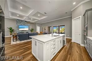 17574 Ashcomb Way Estero, FL 33928 - Photo 5 of 29 a large kitchen with a stove and a refrigerator