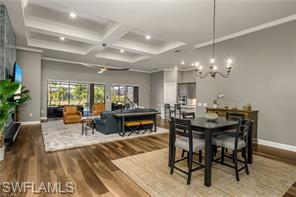 17574 Ashcomb Way Estero, FL 33928 - Photo 10 of 29 a view of a a dining room with furniture window and wooden floor