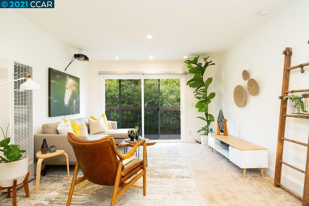 5305 Ridgeview Circle, Unit 8 El Sobrante, CA 94803 - Photo 1 of 1 a living room with furniture and a potted plant