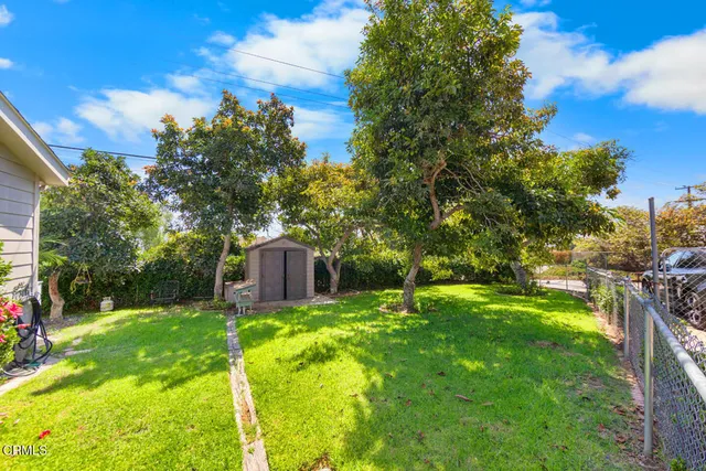 a view of a backyard with a garden