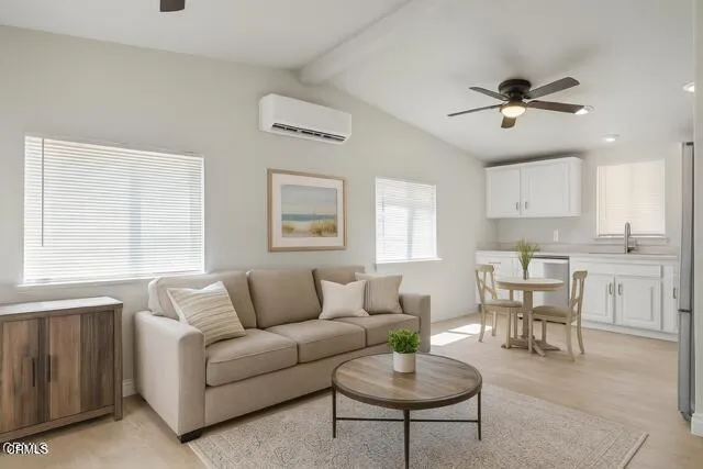 a living room with furniture and a window