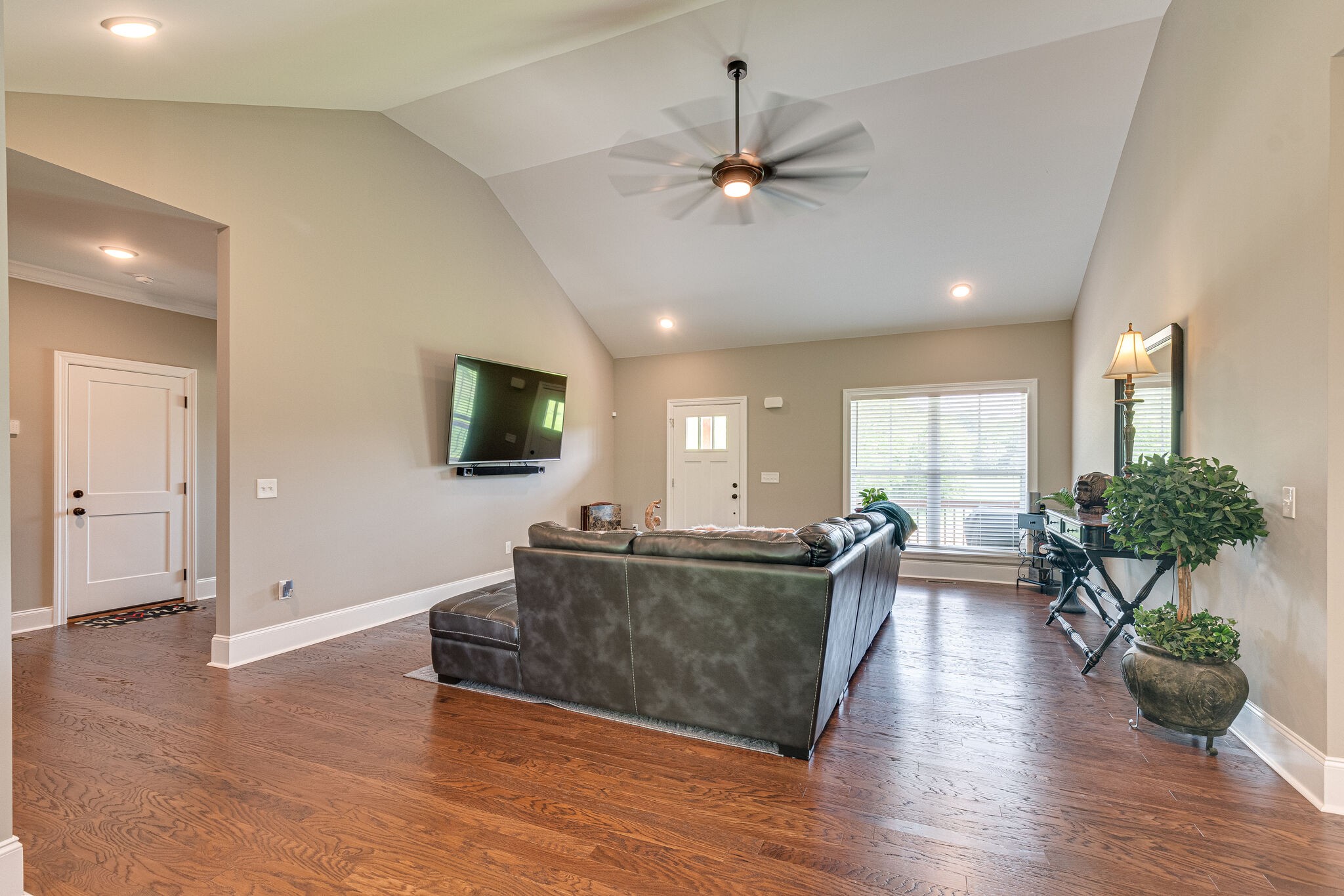 1427 Cliff Amos Road Spring Hill, TN 37174 - Photo 14 of 52 a living room with furniture and a flat screen tv