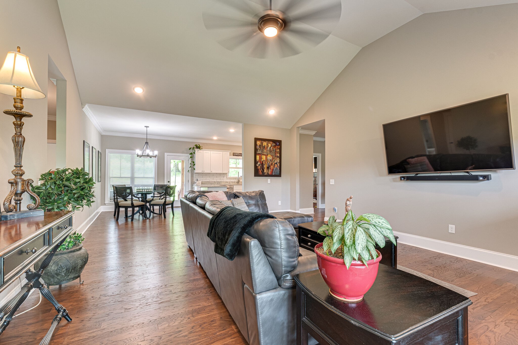 1427 Cliff Amos Road Spring Hill, TN 37174 - Photo 16 of 52 a living room with furniture and a flat screen tv