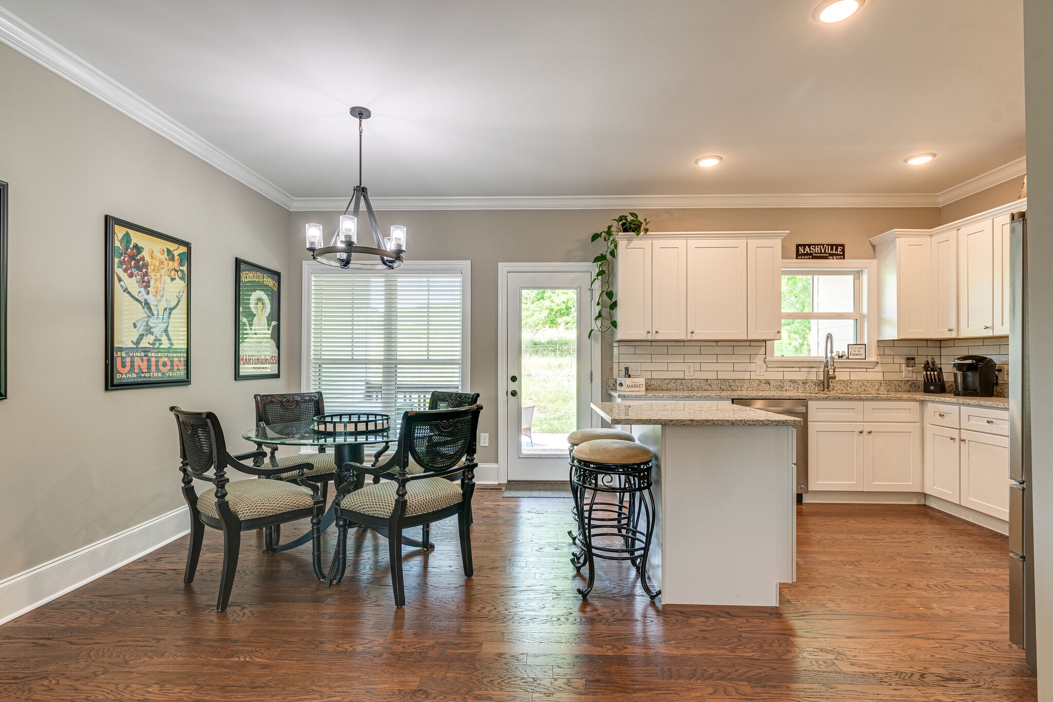 1427 Cliff Amos Road Spring Hill, TN 37174 - Photo 17 of 52 a large kitchen with a table and chairs