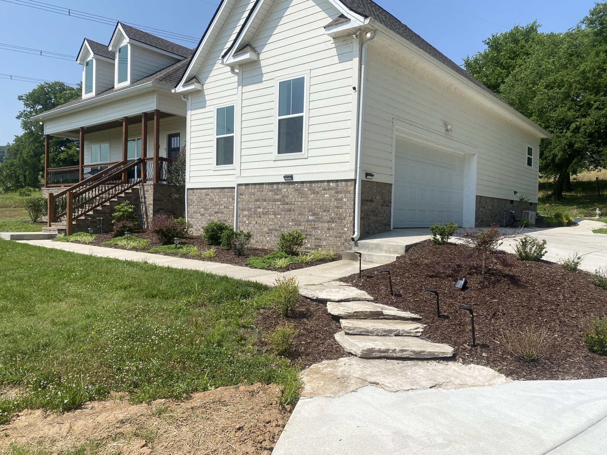 1427 Cliff Amos Road Spring Hill, TN 37174 - Photo 3 of 52 a view of a house with a yard