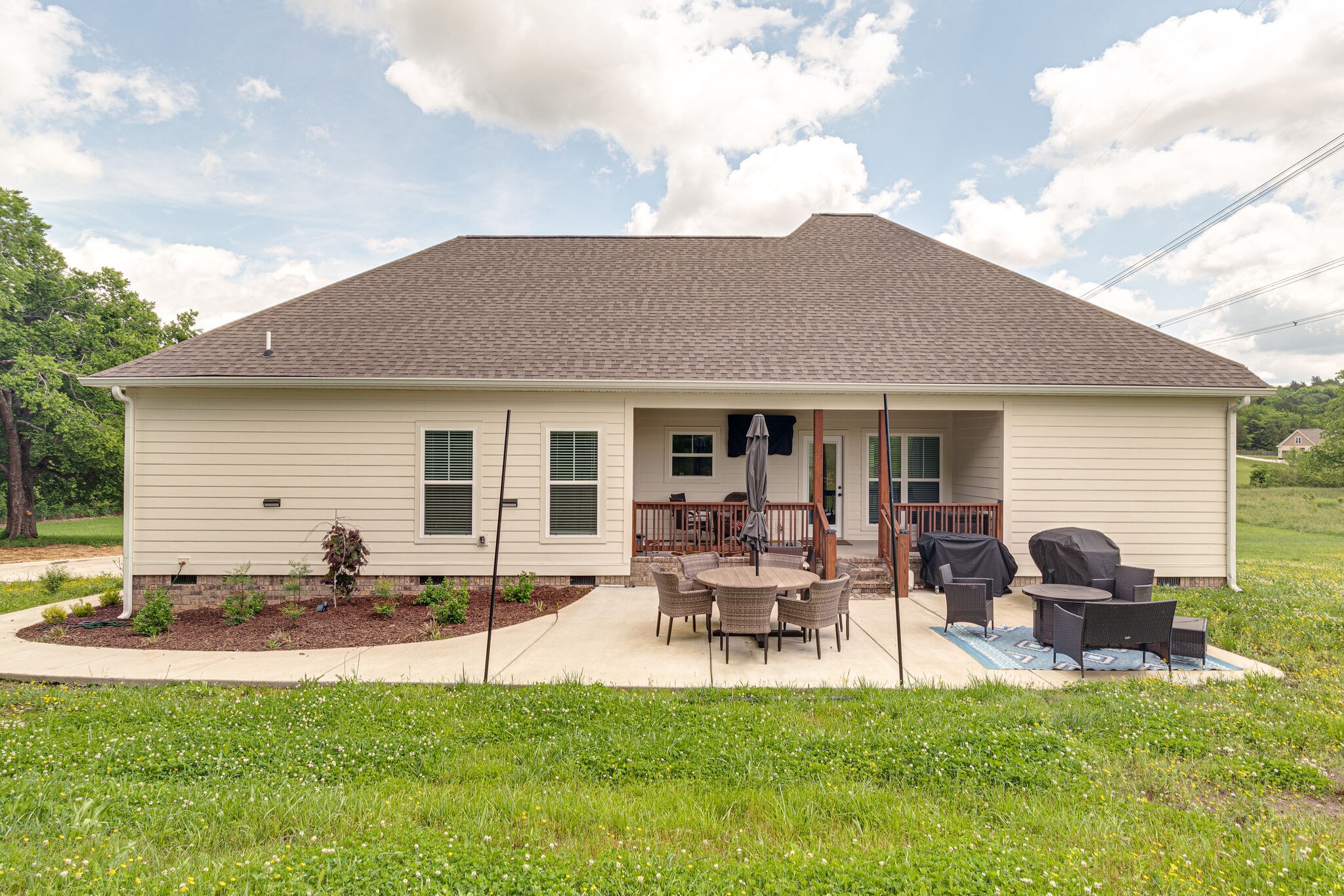 1427 Cliff Amos Road Spring Hill, TN 37174 - Photo 36 of 52 a view of a house with backyard and sitting area