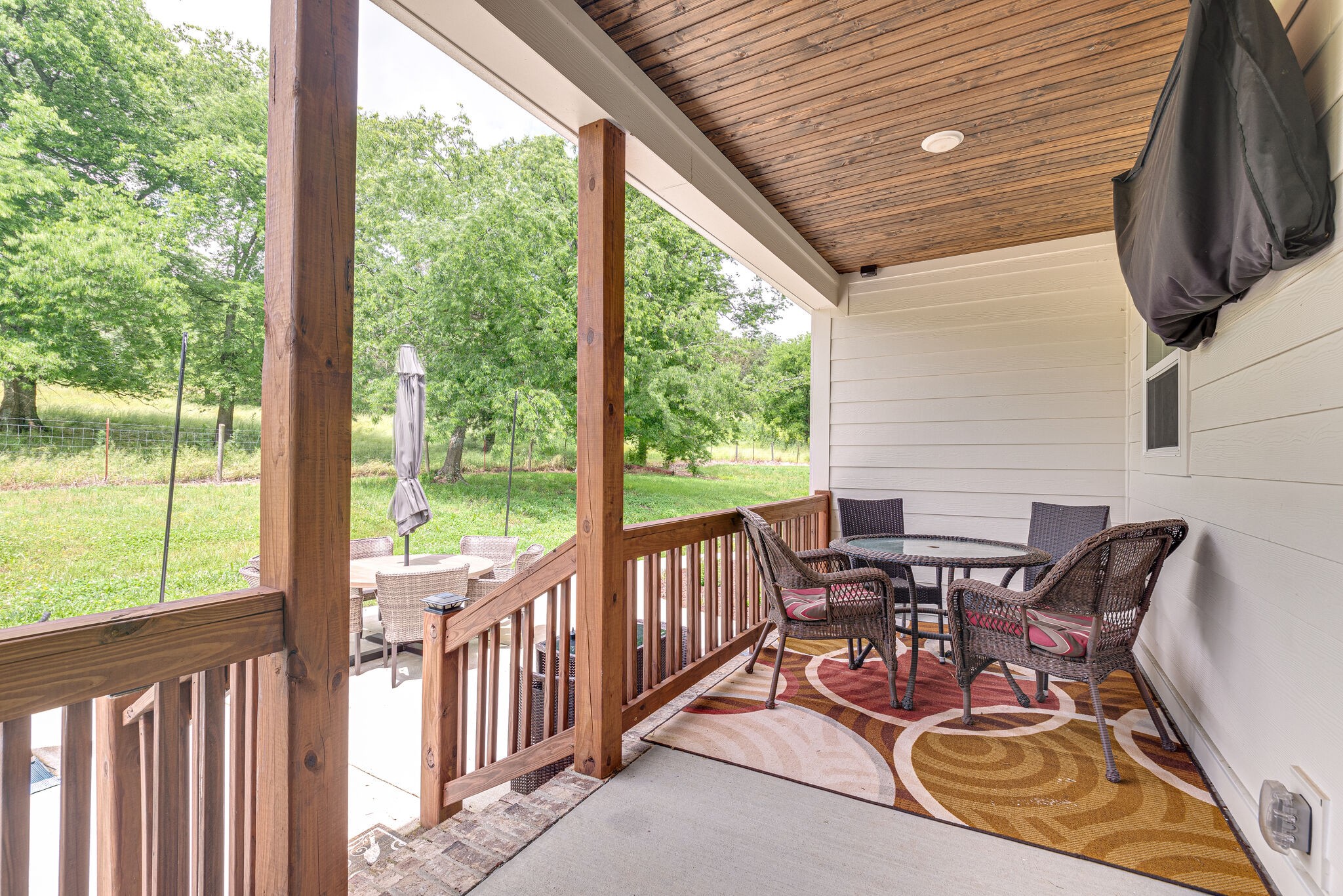 1427 Cliff Amos Road Spring Hill, TN 37174 - Photo 38 of 52 a view of a chairs and table in the balcony