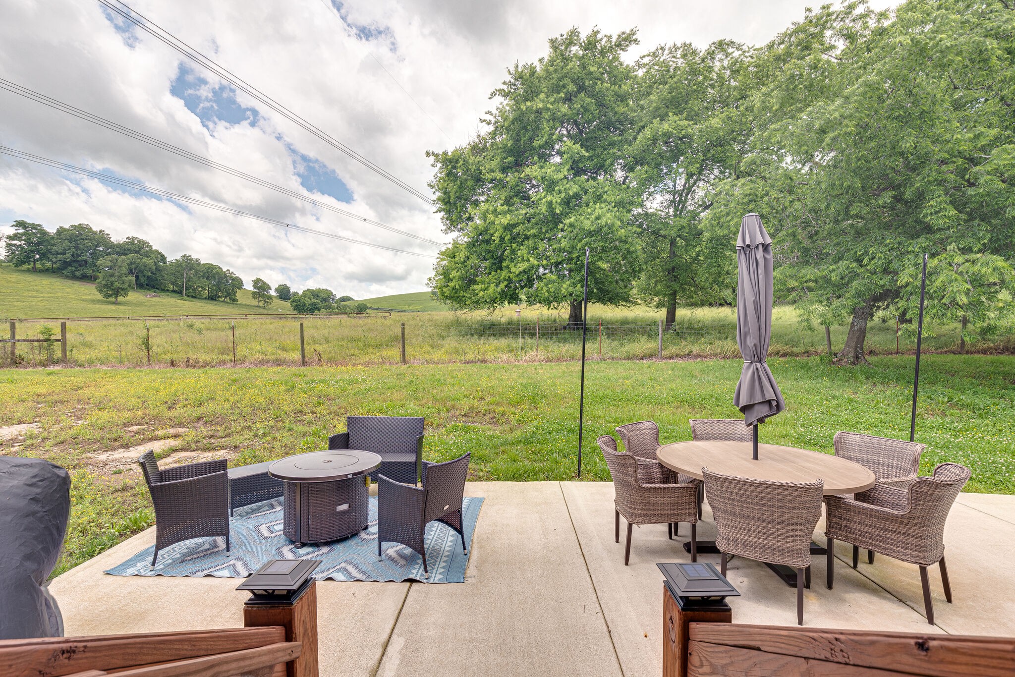 1427 Cliff Amos Road Spring Hill, TN 37174 - Photo 39 of 52 a view of a patio with furniture and garden