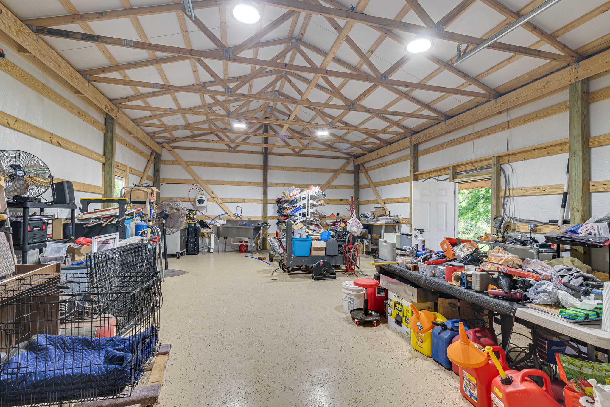 1427 Cliff Amos Road Spring Hill, TN 37174 - Photo 42 of 52 a view of a storage room with a lot of stuff