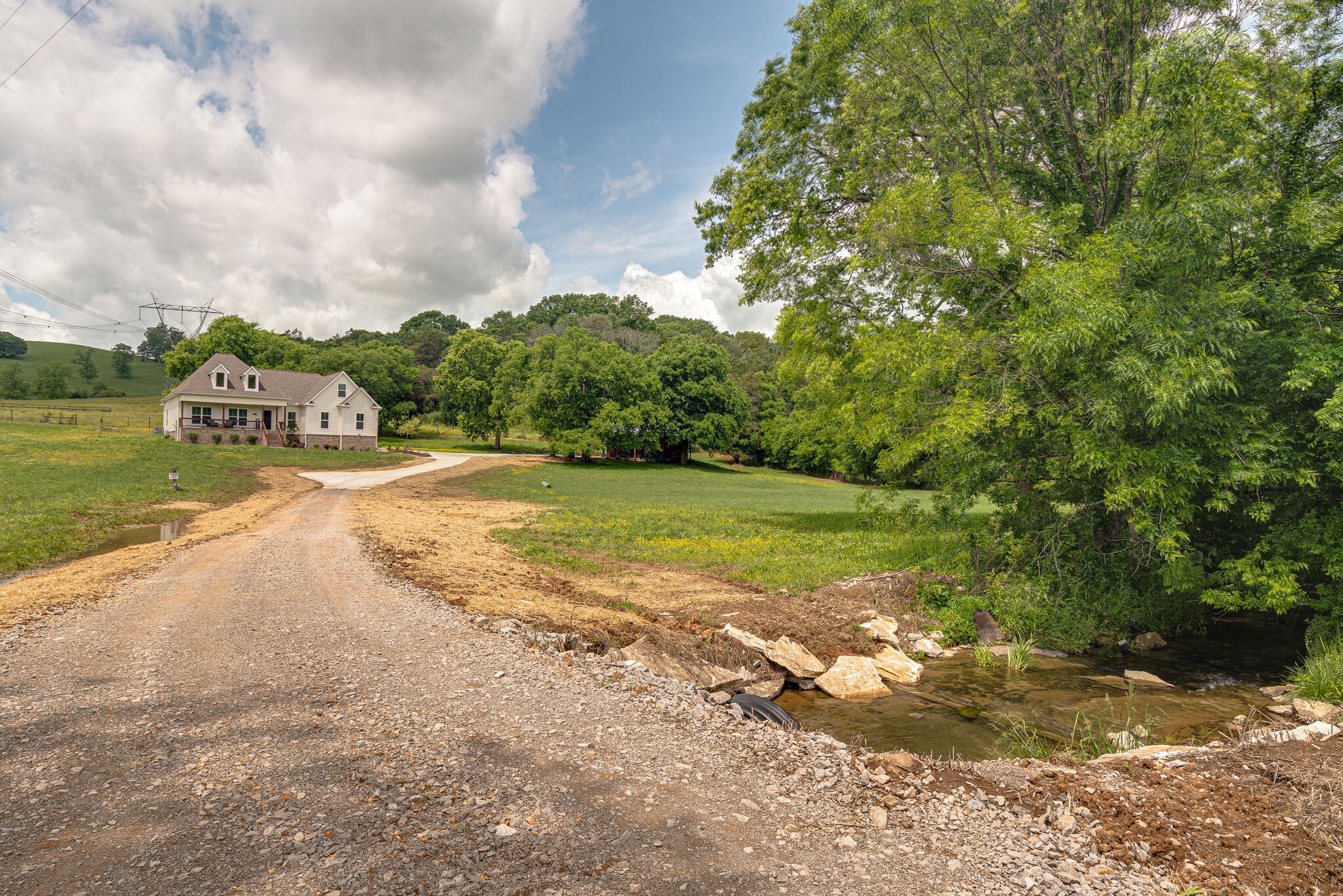 1427 Cliff Amos Road Spring Hill, TN 37174 - Photo 9 of 52 a view of a lake with houses