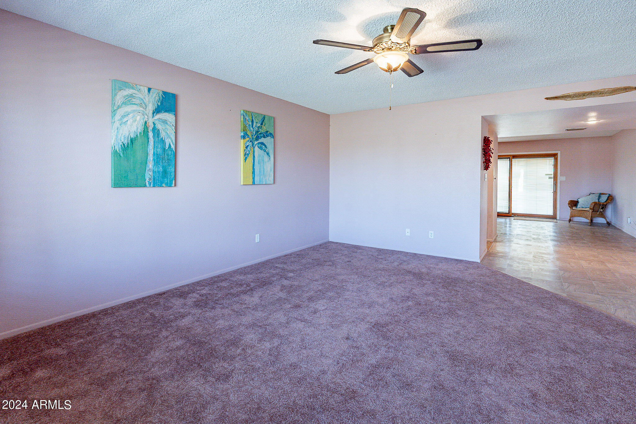 5138 North 81st Street Scottsdale, AZ 85250 - Photo 13 of 40 an empty room with windows and ceiling fan