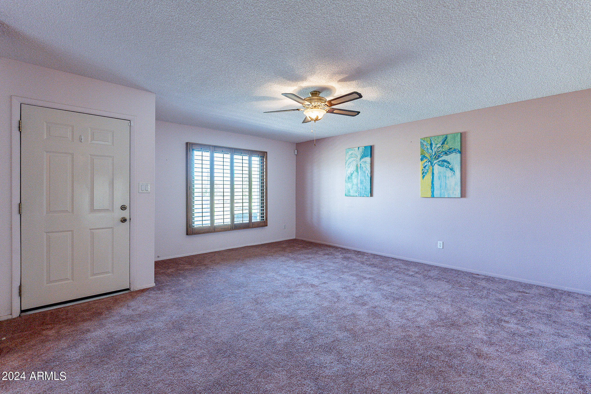 5138 North 81st Street Scottsdale, AZ 85250 - Photo 15 of 40 a view of an empty room with a window