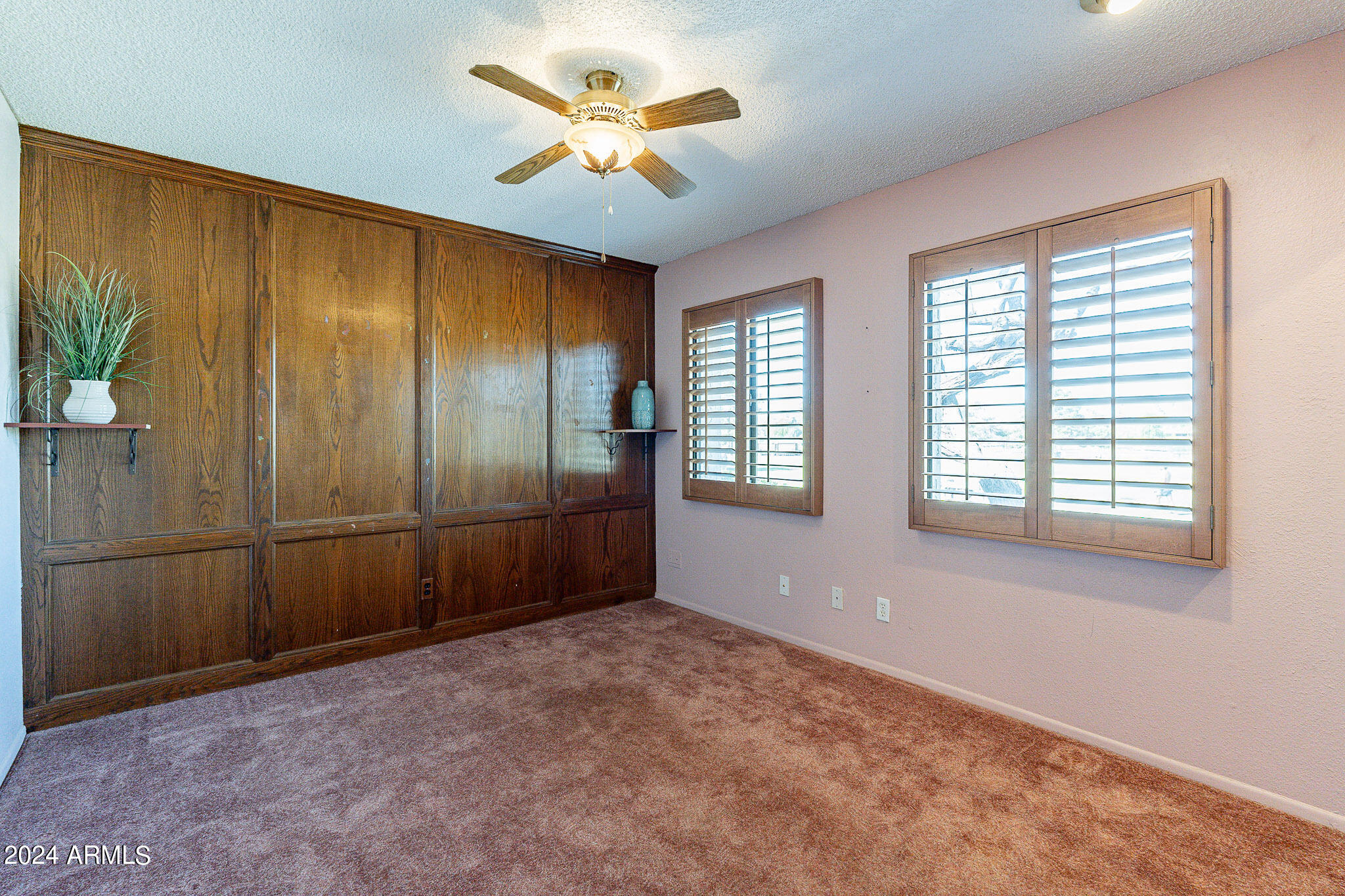 5138 North 81st Street Scottsdale, AZ 85250 - Photo 17 of 40 a view of an empty room with a window