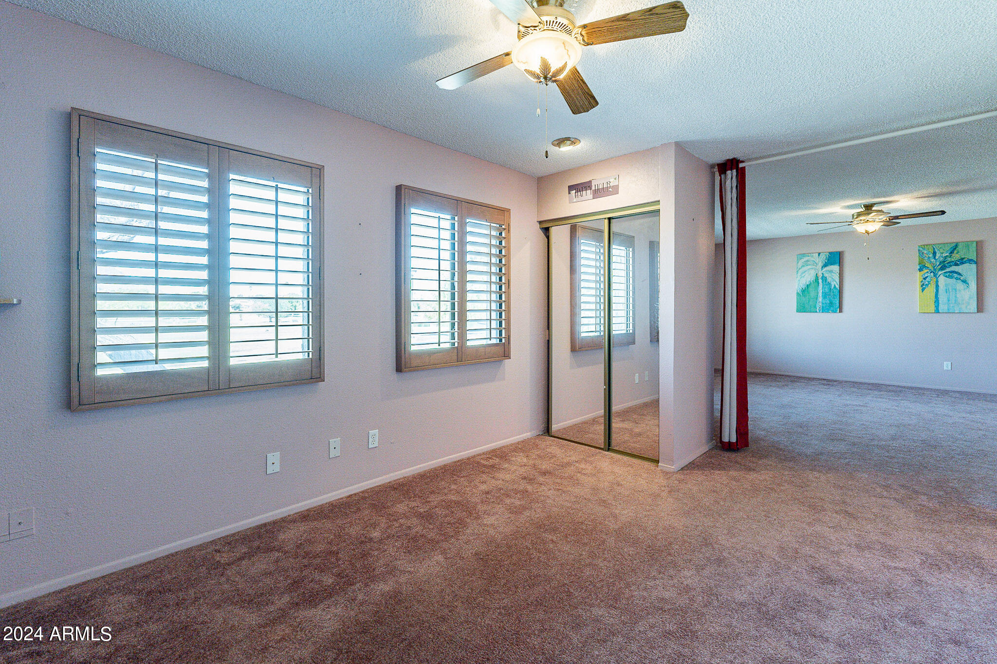 5138 North 81st Street Scottsdale, AZ 85250 - Photo 18 of 40 a view of an empty room with a window