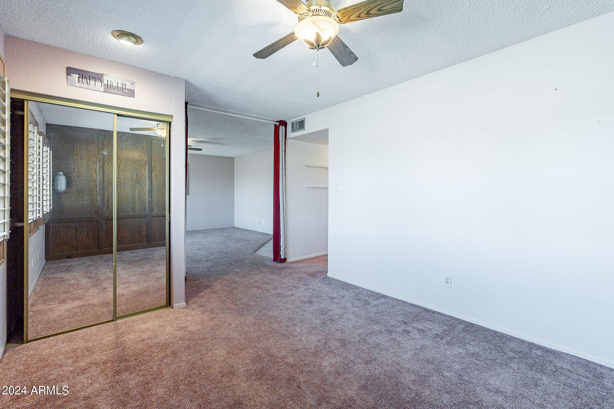5138 North 81st Street Scottsdale, AZ 85250 - Photo 19 of 40 a view of an empty room with a bathroom