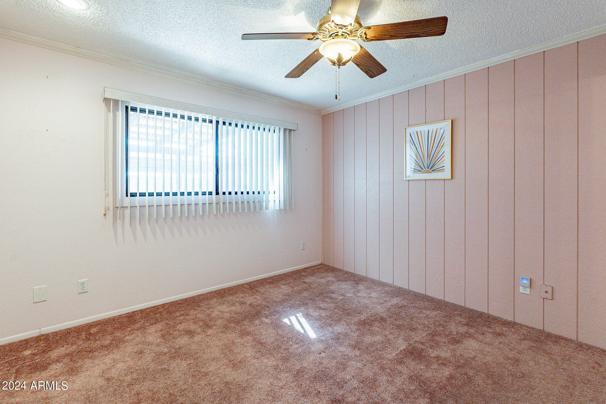 5138 North 81st Street Scottsdale, AZ 85250 - Photo 21 of 40 an empty room with windows and fan