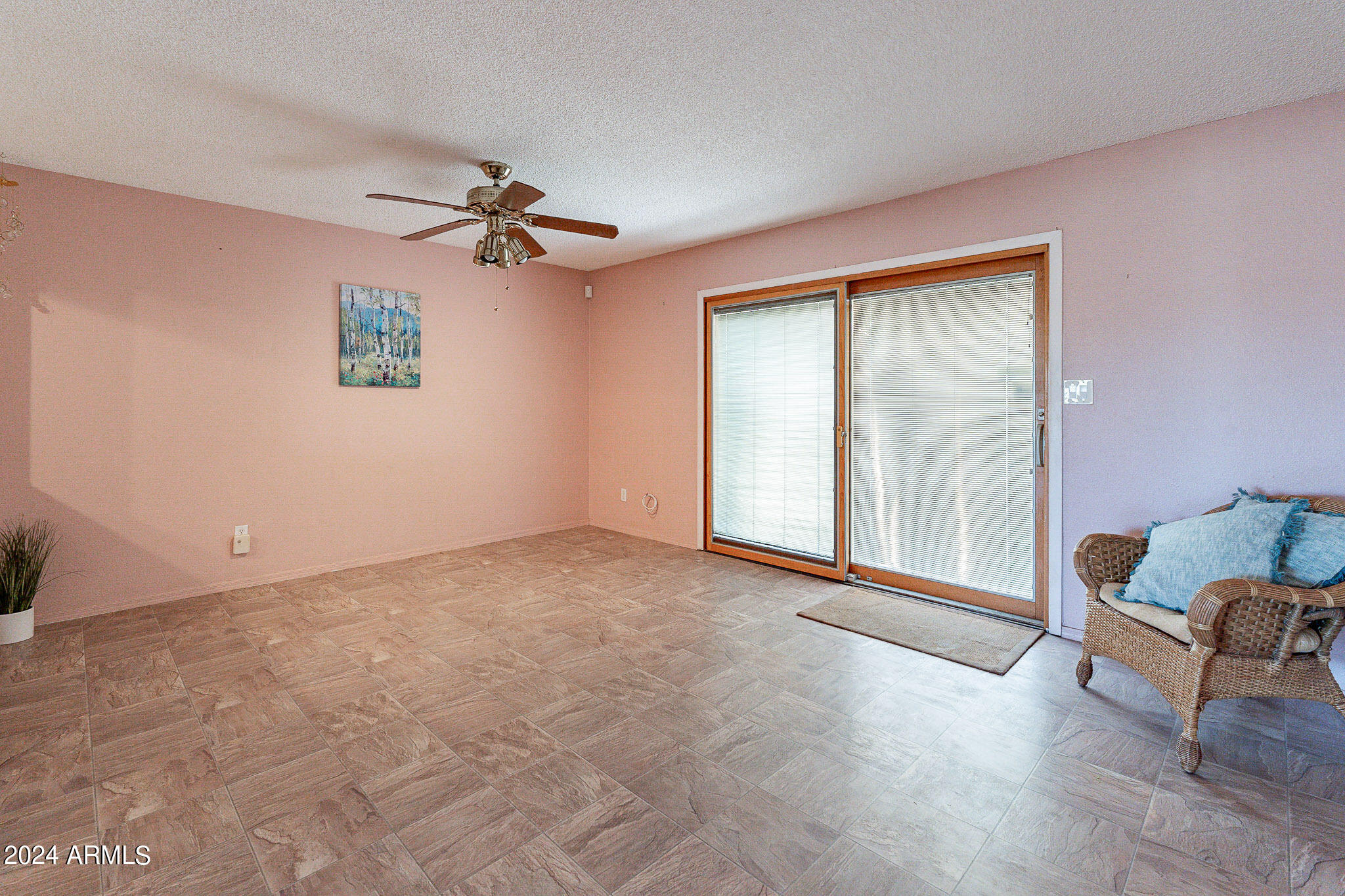 5138 North 81st Street Scottsdale, AZ 85250 - Photo 26 of 40 an empty room with windows and ceiling fan