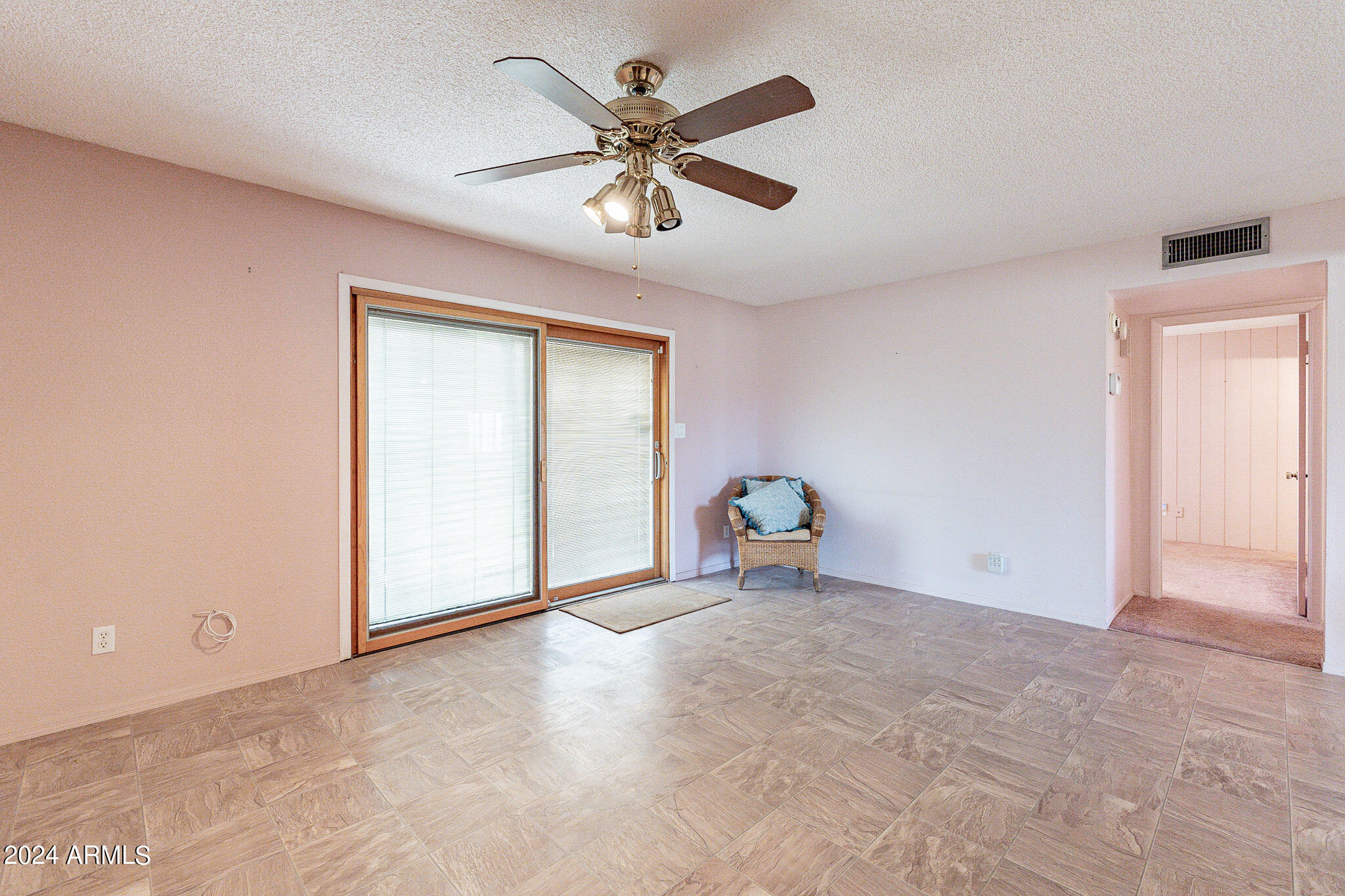 5138 North 81st Street Scottsdale, AZ 85250 - Photo 27 of 40 an empty room with fan and windows