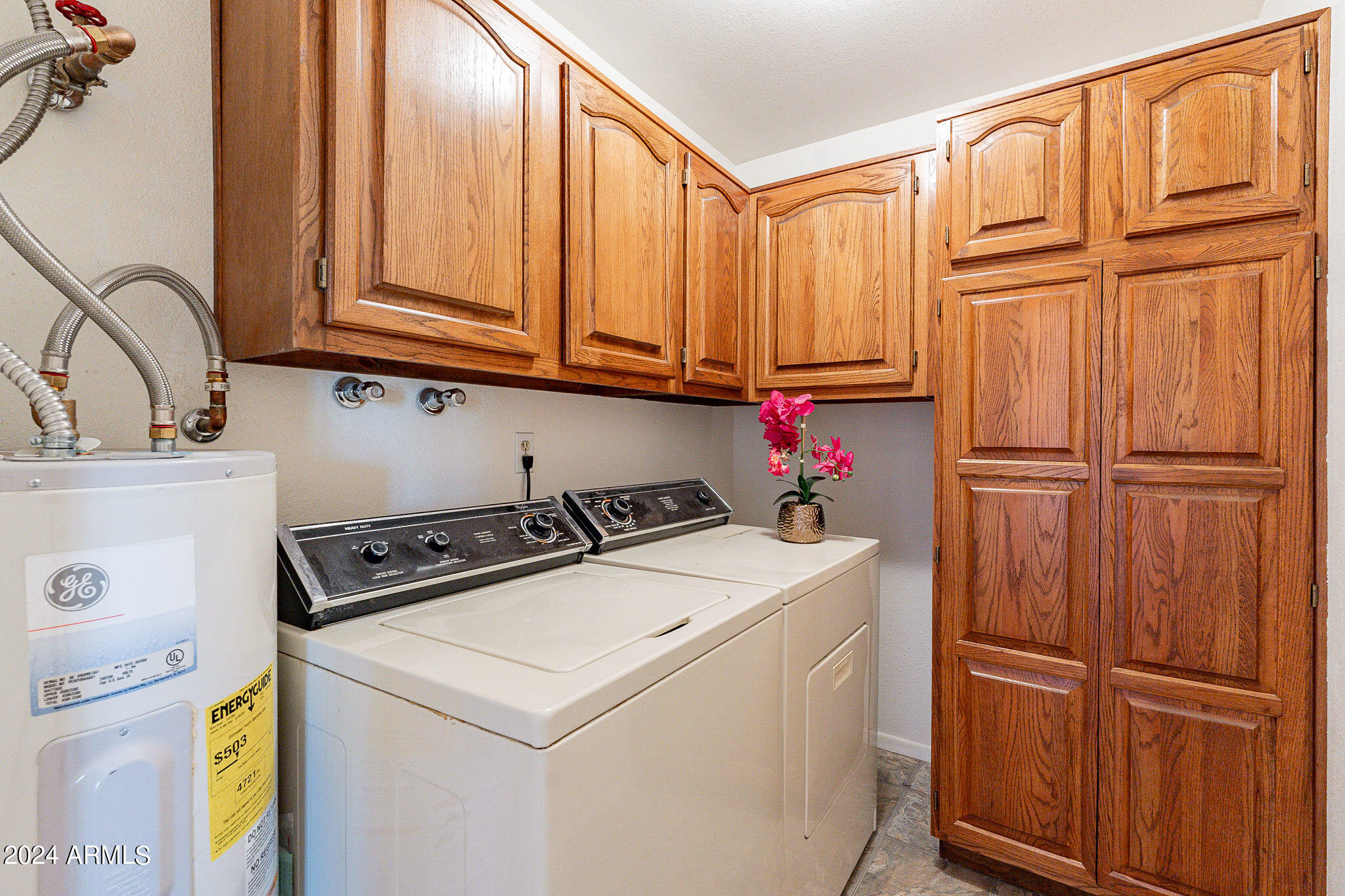 5138 North 81st Street Scottsdale, AZ 85250 - Photo 28 of 40 a utility room with dryer and washer