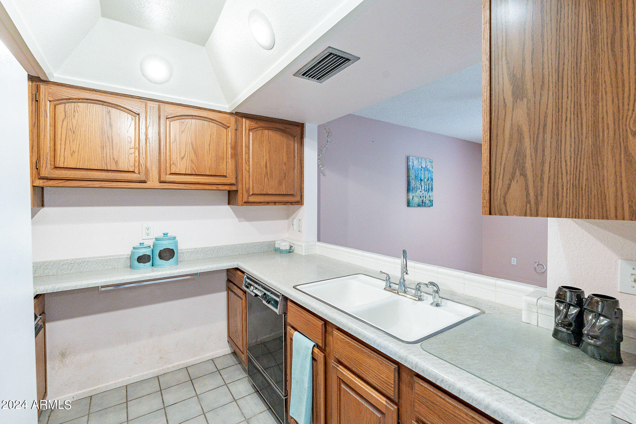 5138 North 81st Street Scottsdale, AZ 85250 - Photo 7 of 40 a kitchen with a sink cabinets and window