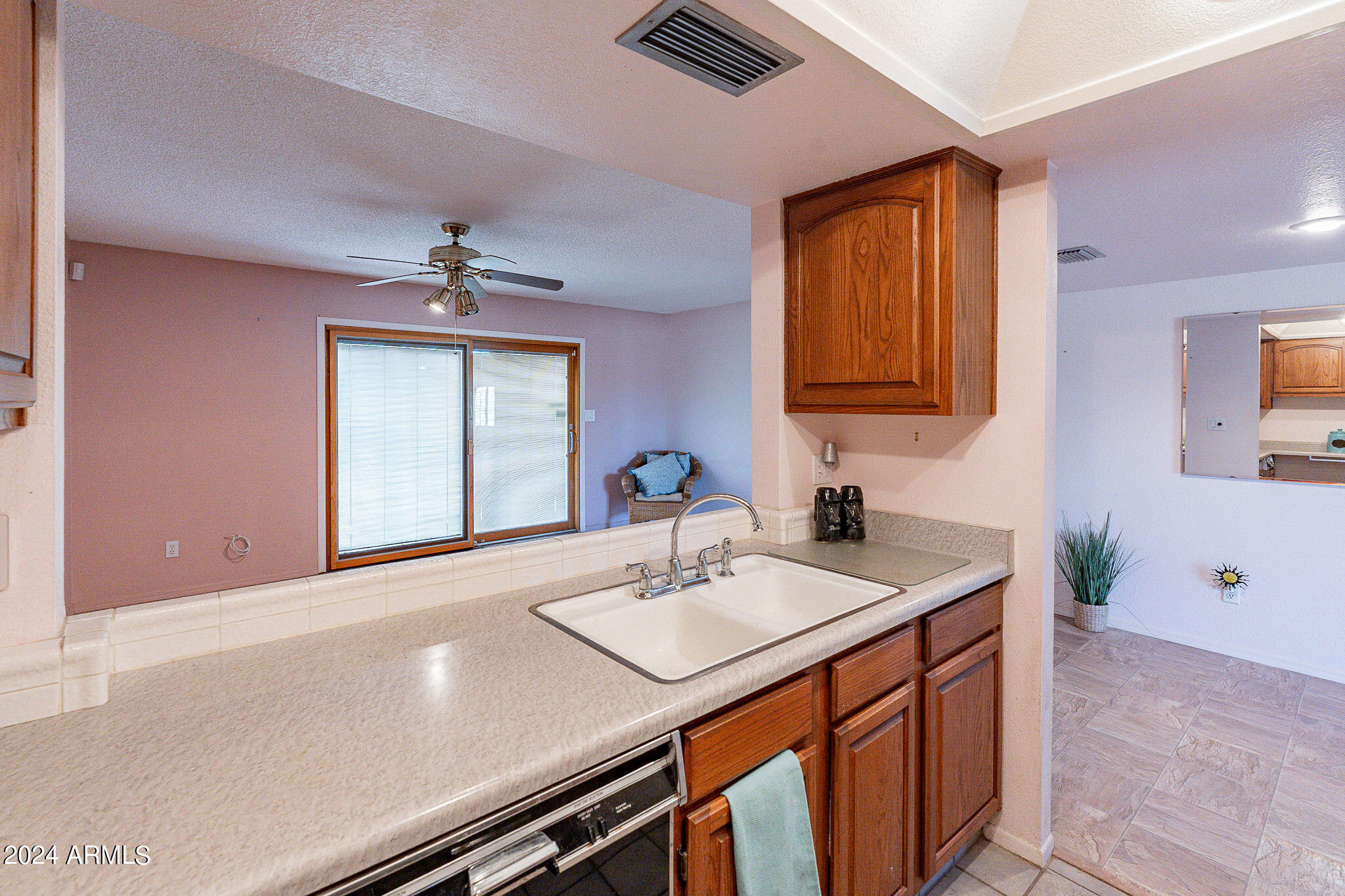 5138 North 81st Street Scottsdale, AZ 85250 - Photo 9 of 40 a bathroom with a sink and a mirror