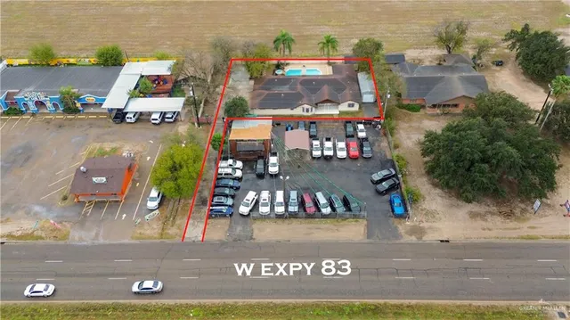 an aerial view of water with outdoor space