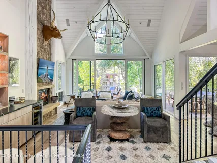 a room with lots of tables and chairs