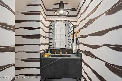 a view of staircase with a rug