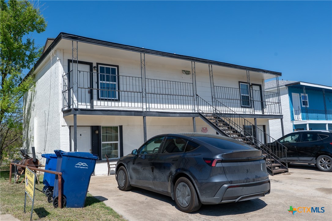 512 Sunset Lane, Unit AD Copperas Cove, TX 76522 - Photo 4 of 23 a car parked in front of a house