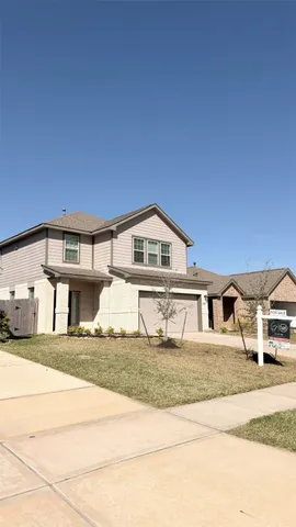 a house view with a outdoor space