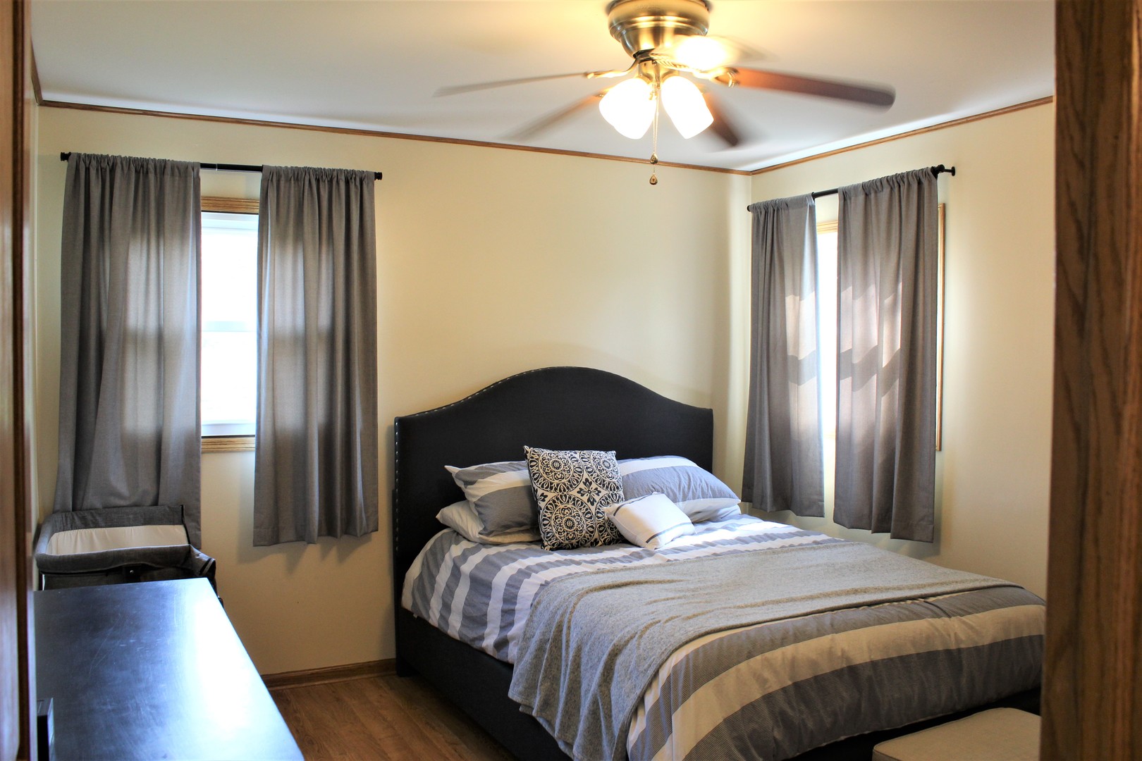 508 Northgate Road Lindenhurst, IL 60046 - Photo 9 of 27 a bedroom with a bed and wooden floor