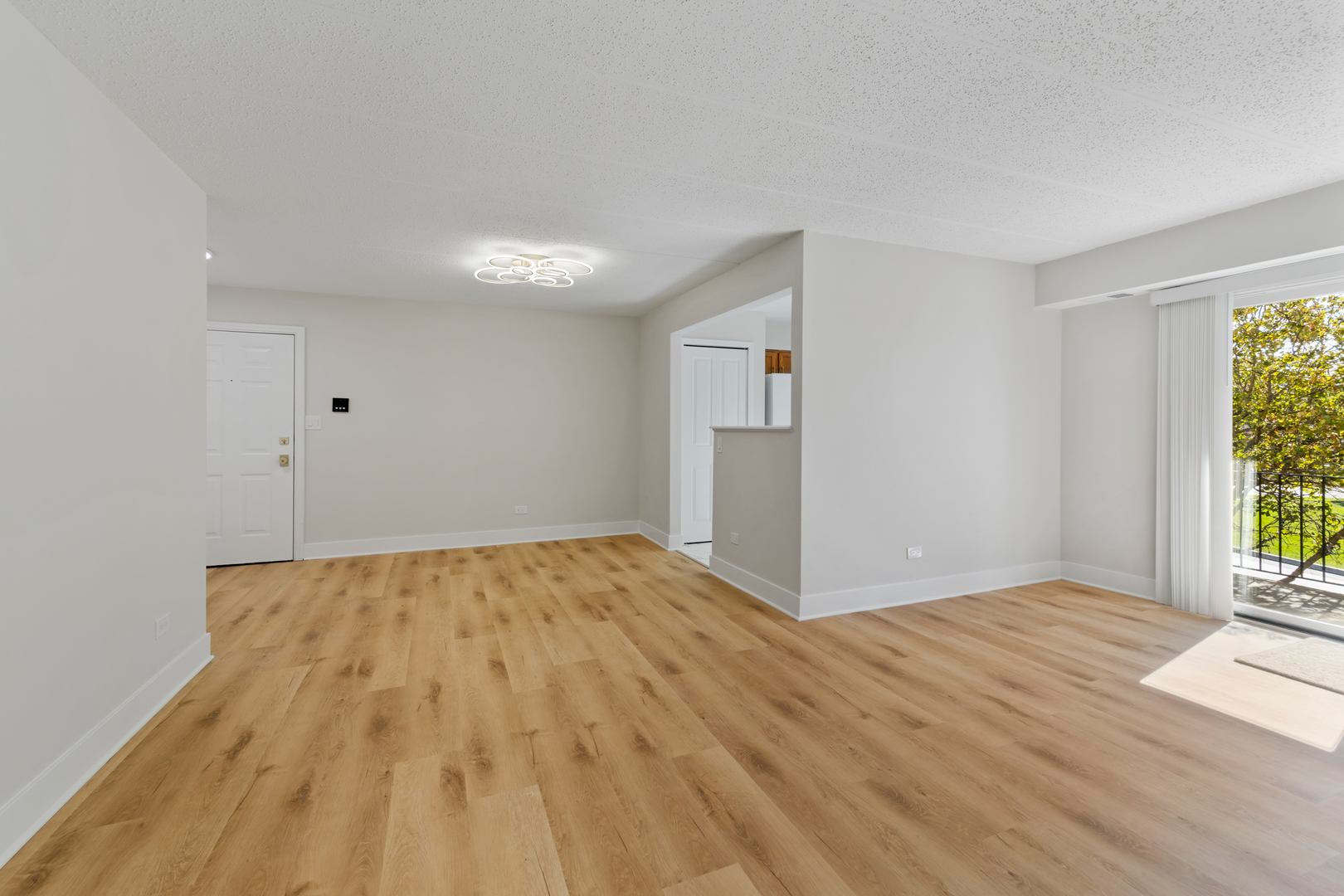 18310 Robin Lane, Unit D2 Homewood, IL 60430 - Photo 9 of 17 a view of an empty room and window