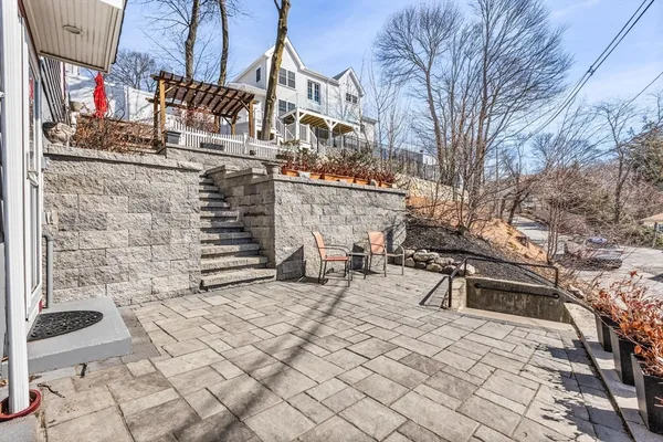 a view of a patio with a yard