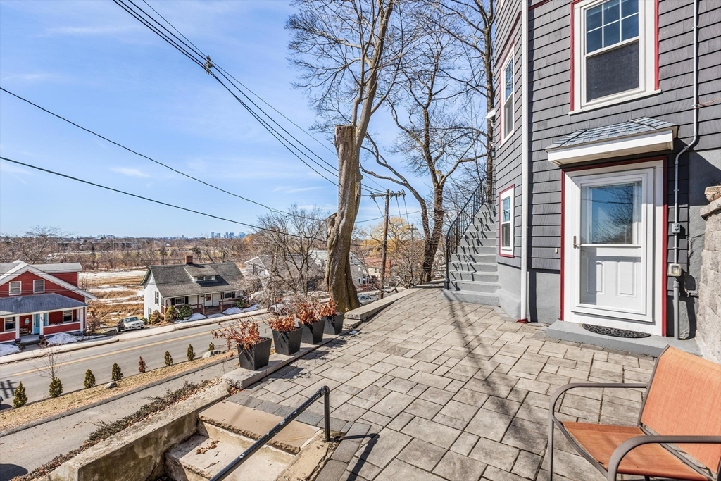 2 Deane Avenue, Unit A Winthrop, MA 02152 - Photo 15 of 18 a view of a patio with a yard
