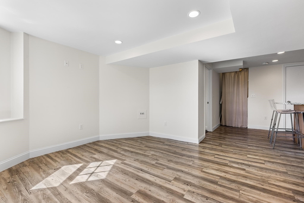 2 Deane Avenue, Unit A Winthrop, MA 02152 - Photo 8 of 18 a view of a livingroom with wooden floor