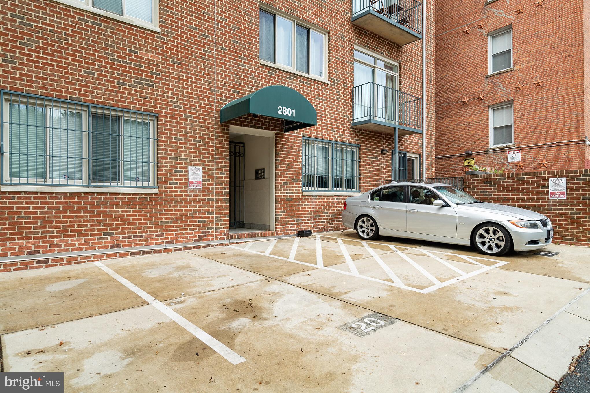 2801 Connecticut Avenue Northwest, Unit 16 Washington, DC 20008 - Photo 14 of 17 a car parked in front of a building