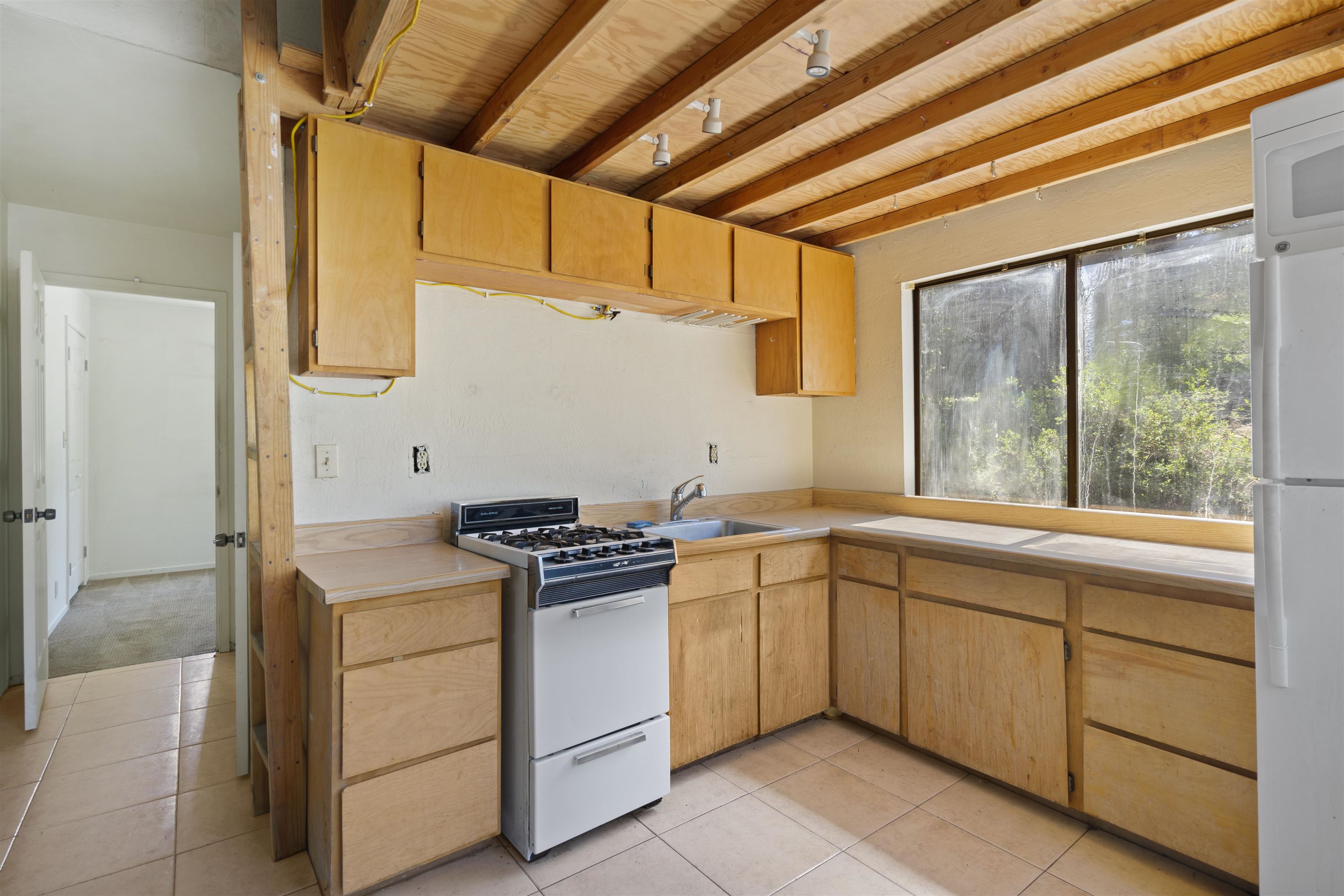 40 Gull Street Mammoth Lakes, CA 93546 - Photo 23 of 44 a kitchen with a stove and a sink