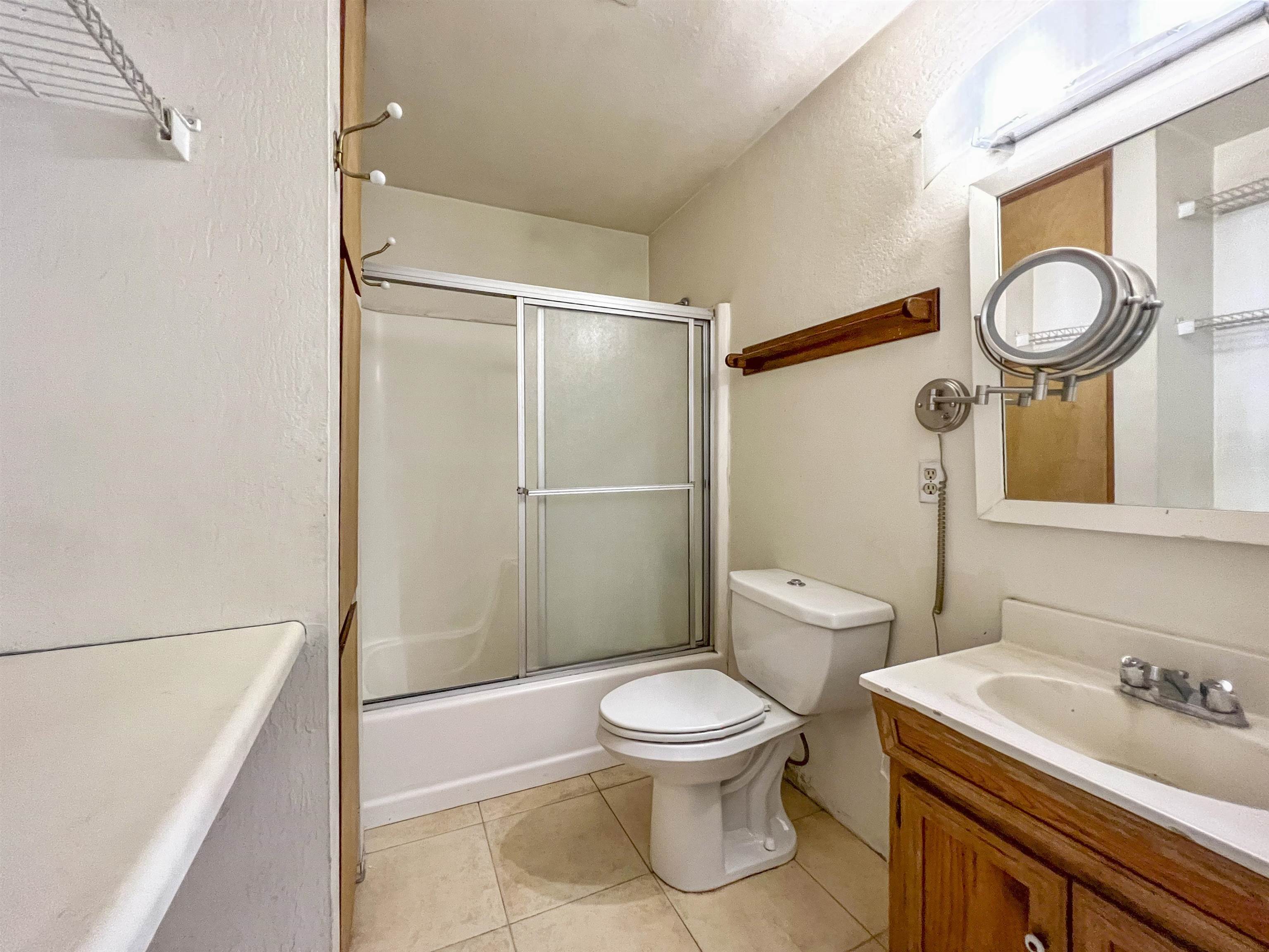 40 Gull Street Mammoth Lakes, CA 93546 - Photo 31 of 44 a bathroom with a toilet a sink and a shower